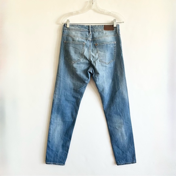 Mid Rise Tapered Distressed Slim Jeans - Picture 2 of 7